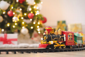 Model Train Going Around Christmas Tree